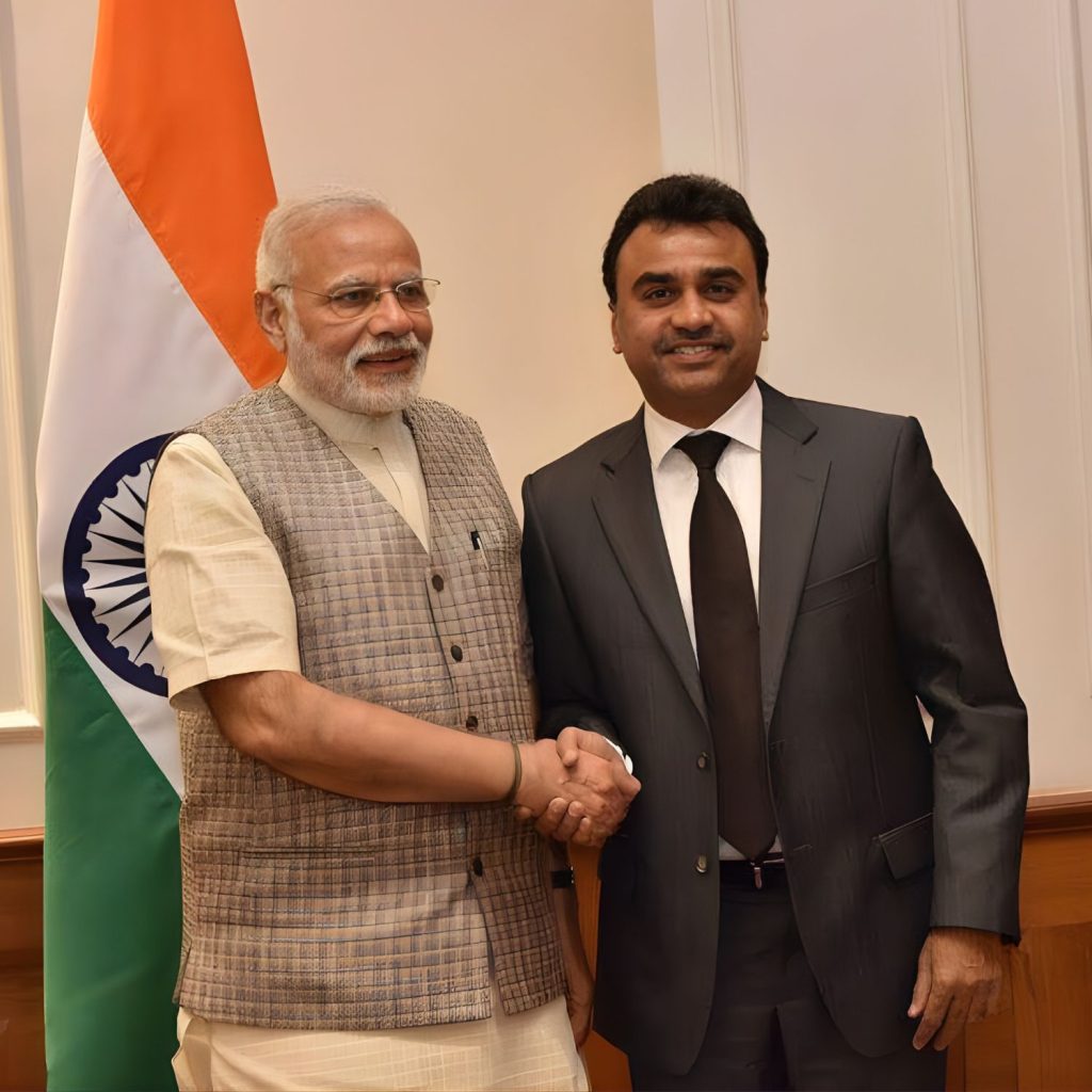 Rizwan Adatia with PM Narendra Modi Esy ID